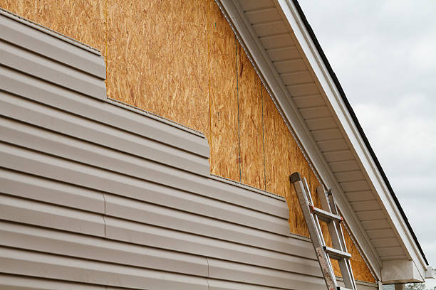 Professional Emergency Siding Repair technician working in Fort Loudon, PA